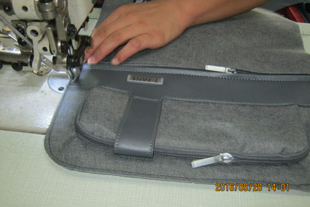 專業(yè)背包生產廠家 廣東包工廠直供TCL鐵粉節(jié)禮品背包